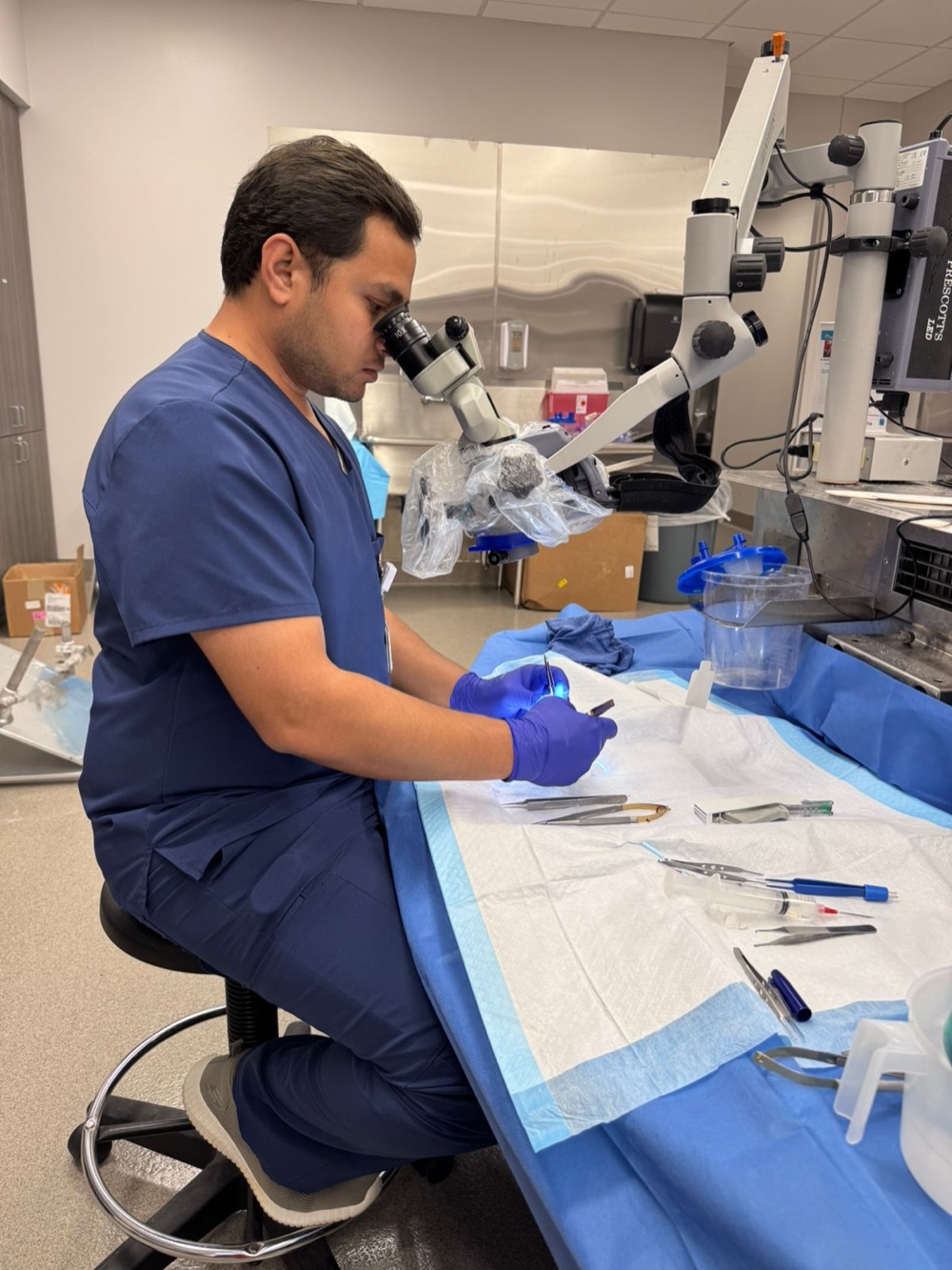 Dr Rahul Gupta practising microsurgery under the operating microscope